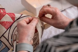 Dorie Wilkie preparing the Great Tapestry of Scotland